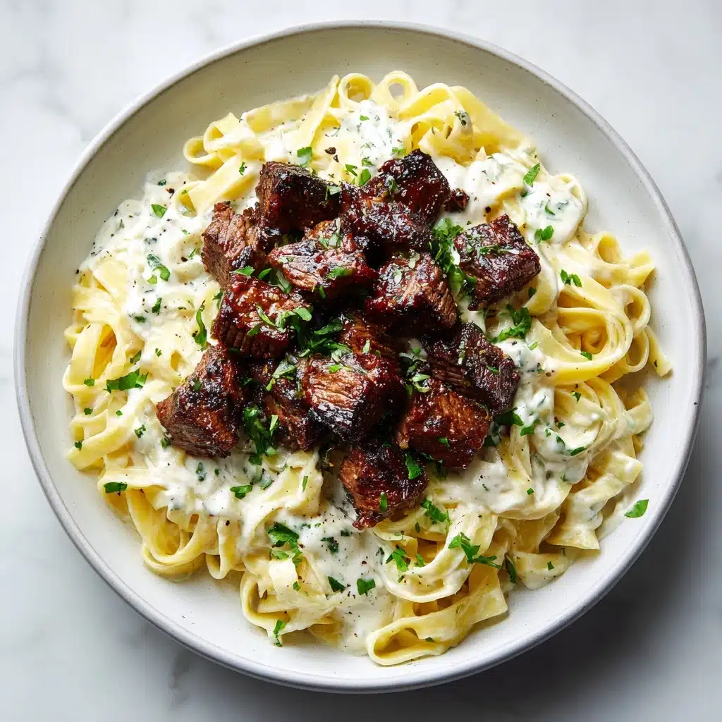 Garlic Butter Steak Bites with Creamy Parmesan Pasta Recipe - Recipe Image