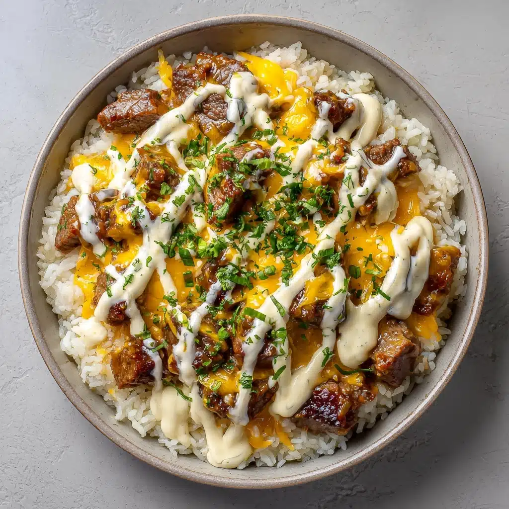 Garlic Butter Beef and Rice Skillet with Cheddar Parmesan Sauce Recipe