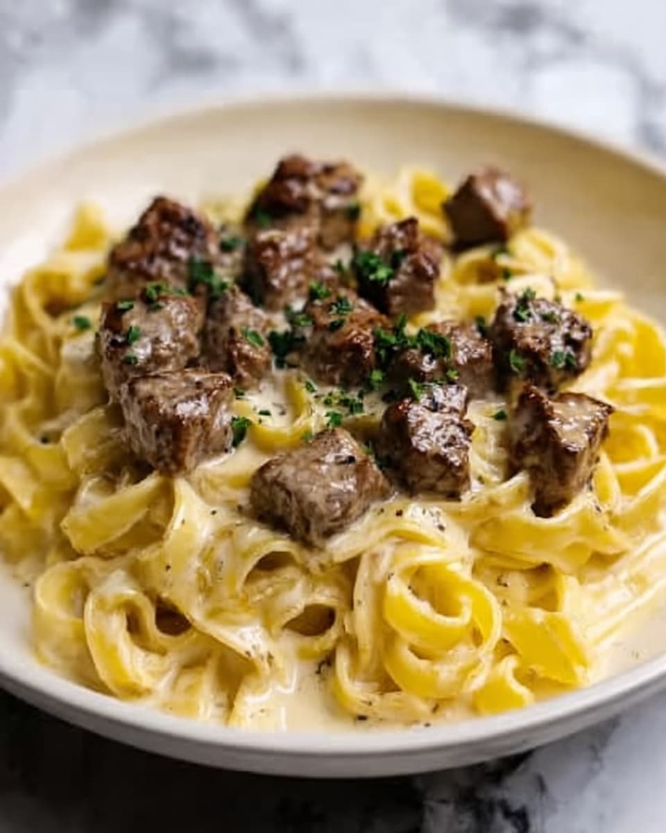 Garlic Butter Steak Bites with Creamy Parmesan Pasta Recipe - Recipe Image