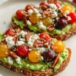 Avocado Toast with Feta, Cherry Tomatoes, Cranberries, and Walnuts Recipe