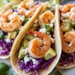 Spicy Cajun Shrimp Tacos with Cabbage, Avocado, and Lime Recipe