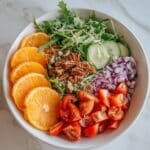 Citrus Arugula Salad with Goat Cheese and Toasted Nuts Recipe