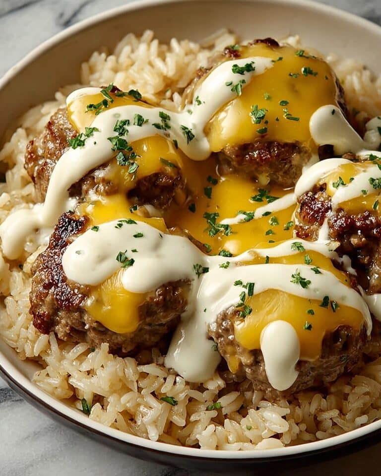 Garlic Butter Beef and Rice Skillet with Cheddar Parmesan Sauce Recipe