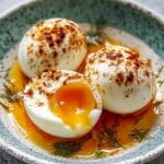 Turkish Eggs (Cilbir) with Spiced Butter and Fresh Herbs Recipe