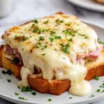 Classic Croque Monsieur baked with Gruyère, ham, and creamy béchamel Recipe