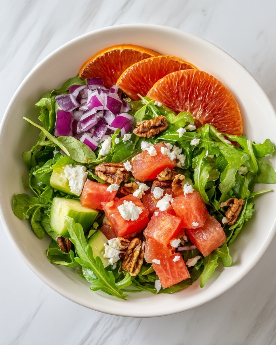Citrus Arugula Salad with Goat Cheese and Toasted Nuts Recipe - Recipe Image