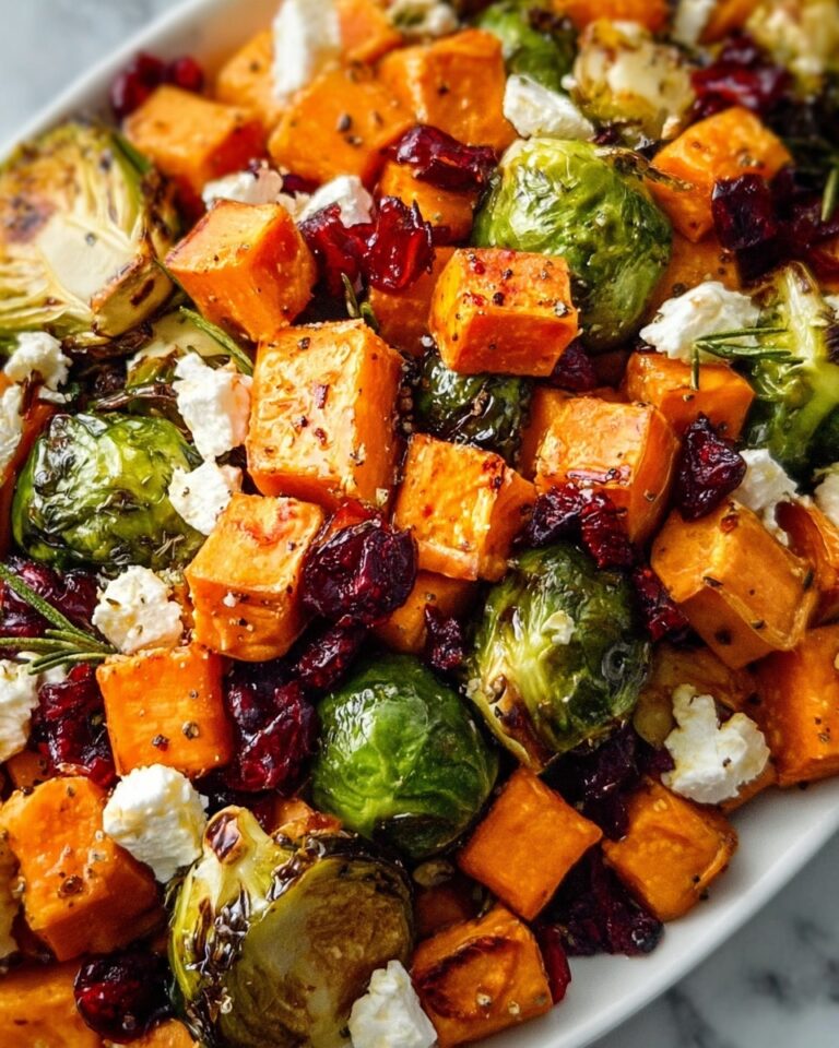 Cranberry-Glazed Roasted Butternut Squash, Brussels Sprouts, and Sweet Potato Salad Recipe