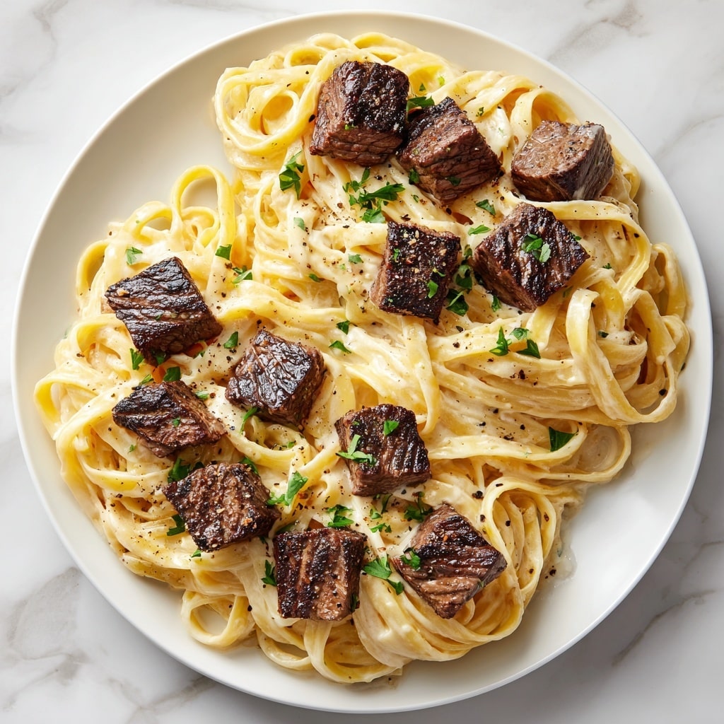 Garlic Butter Steak Bites with Creamy Parmesan Pasta Recipe