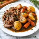 Hearty Slow Cooker Pot Roast with Carrots and Potatoes Recipe