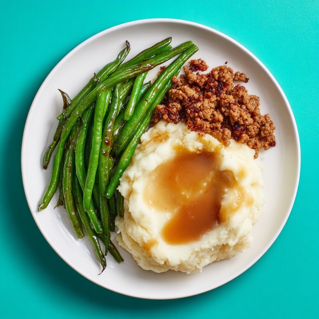 Garlic Butter Steak Bites with Mashed Potatoes and Green Beans Recipe - Recipe Image