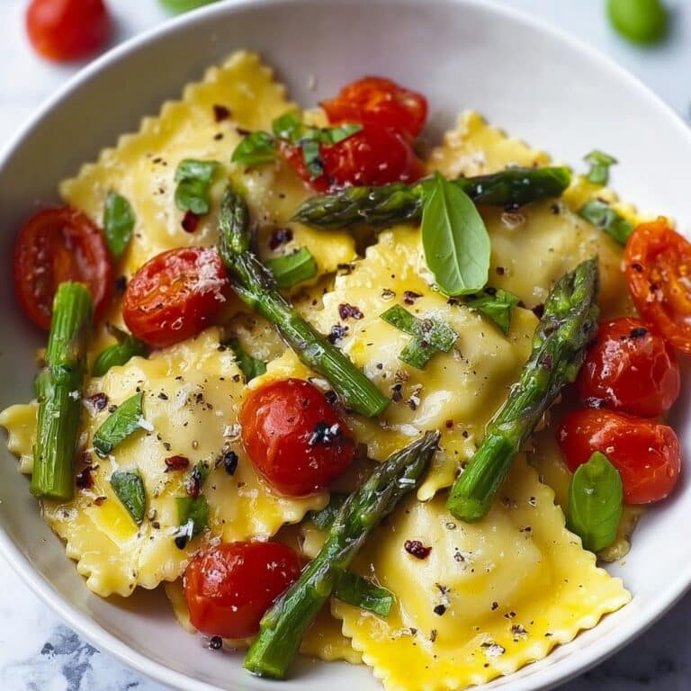 Ravioli with Cherry Tomatoes, Asparagus, and Fresh Herbs Recipe